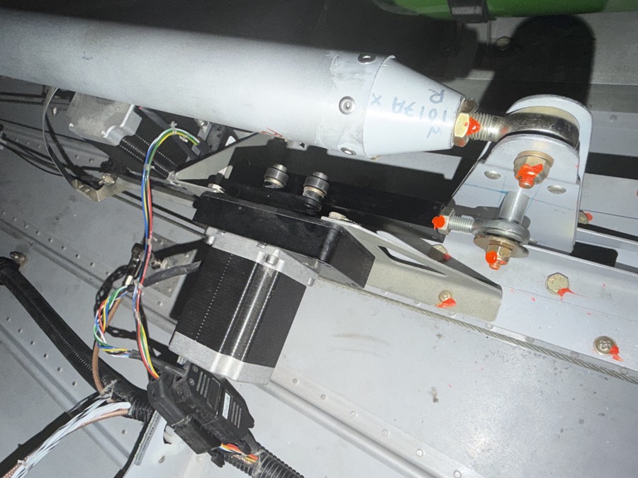 Pitch servo reinstalled after the pulley swap, torque seal on the linkage hardware